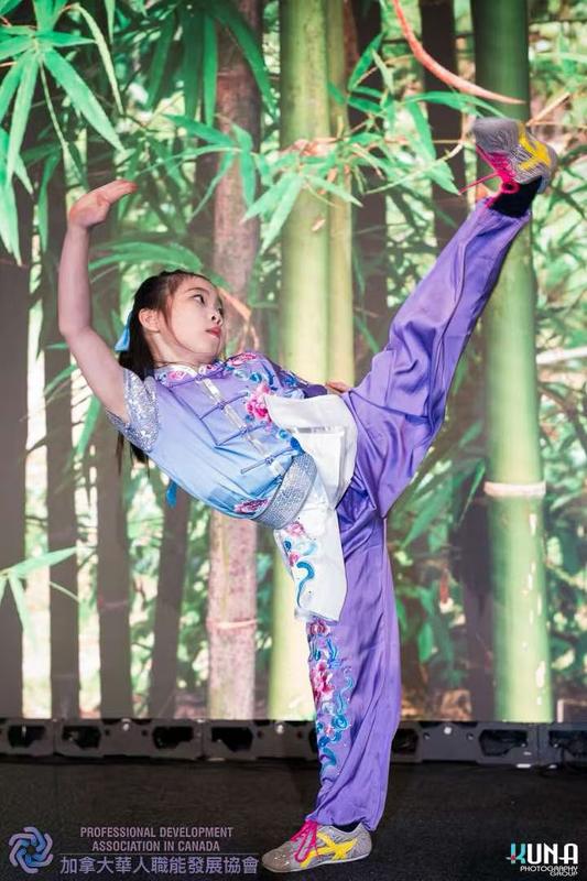 Student holding a high front kick