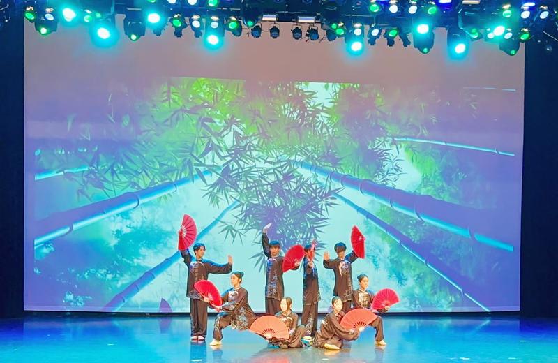 Taichi fan performance on stage